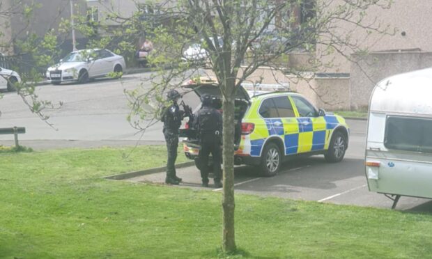 Armed police in Kelty.