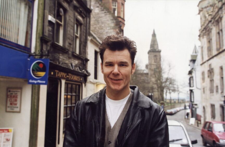 Adamson outside the pub he owned in Dunfermline in 1996.