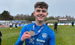 Adam Carnwath his his first ever senior medal