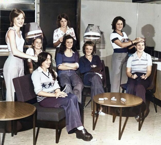a group of ladies at a hairdressing session in the Beauty Culture Class at the new Ardler Community Centre.