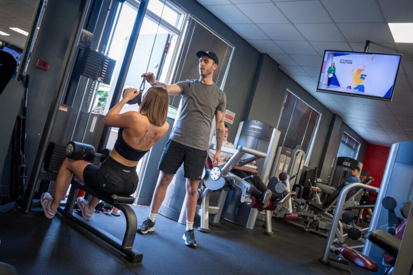 Jack Nicol, manager at Arena Gym in Kirkcaldy, with one of the members.