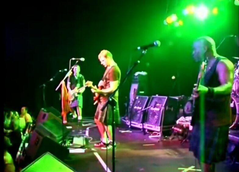 The band in kilts in Glasgow. 