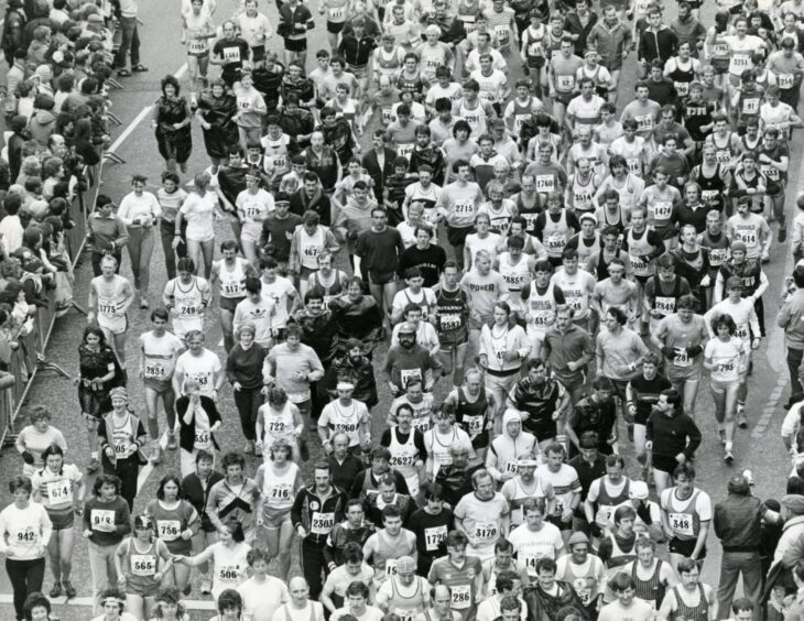 An aerial shots shows a mass of bodies at the start of the Dundee marathon in 1985