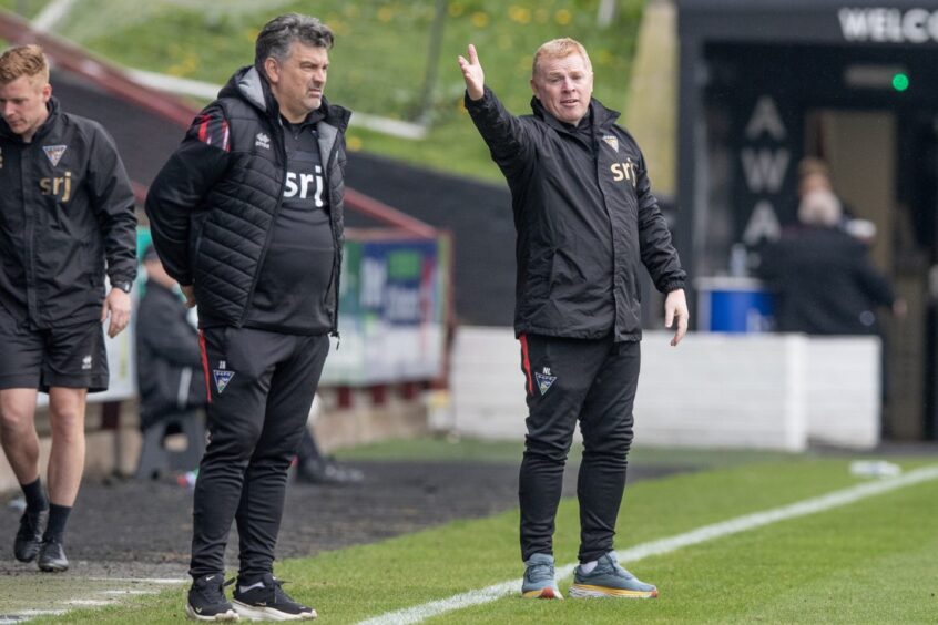 Dunfermline manager Neil Lennon gesticulates on the touchline beside assistant Iain Brunskill.