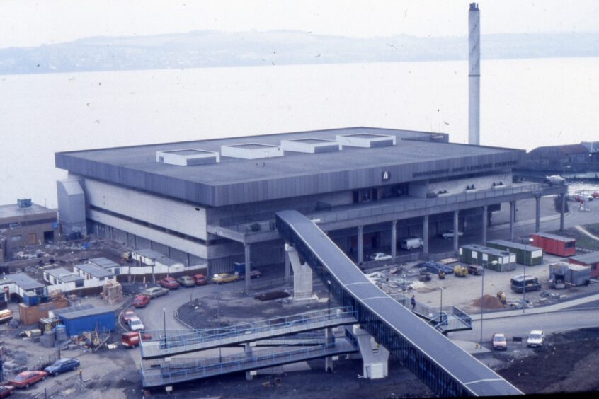 an aerial view of Dundee Leisure Centre with the River Tay and the Fife coastline in the background.