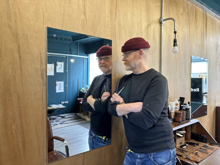 Ed looking in the mirror
