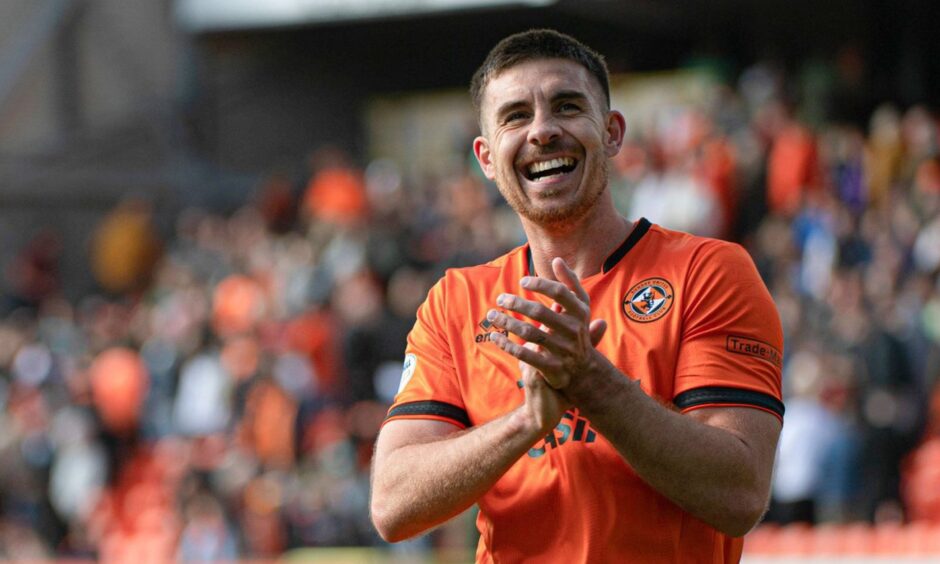 Declan Gallagher applauds the Dundee United fans.
