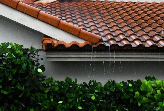 Roof with rain pouring off