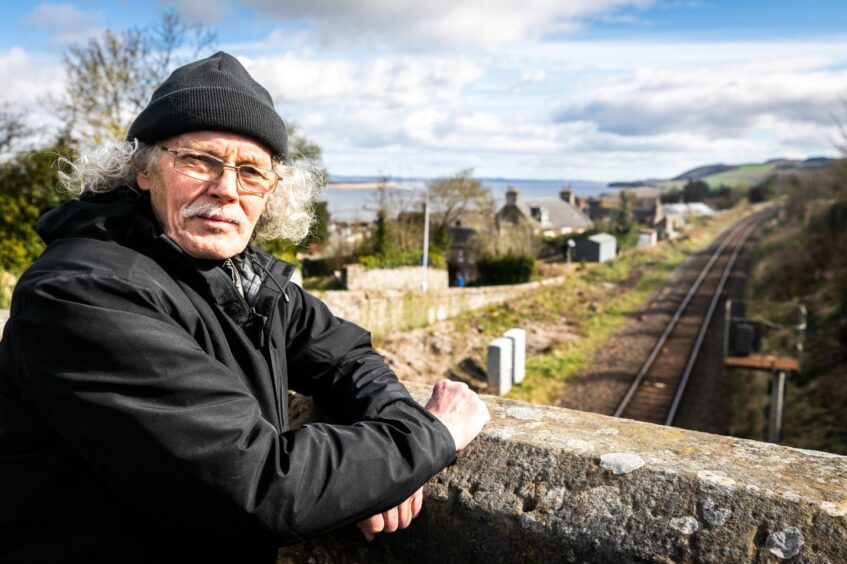Courier News - Fife - Aileen Robertson - Newburgh Train Station Campaign - CR0027477 - Newburgh - Picture Shows: Nigel Mullan of Newburgh Tain Station Campaign at the track currently running through the town. 