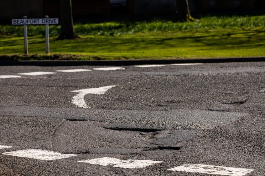 Potholes on Beaufort Drive in Glenrothes, Fife 