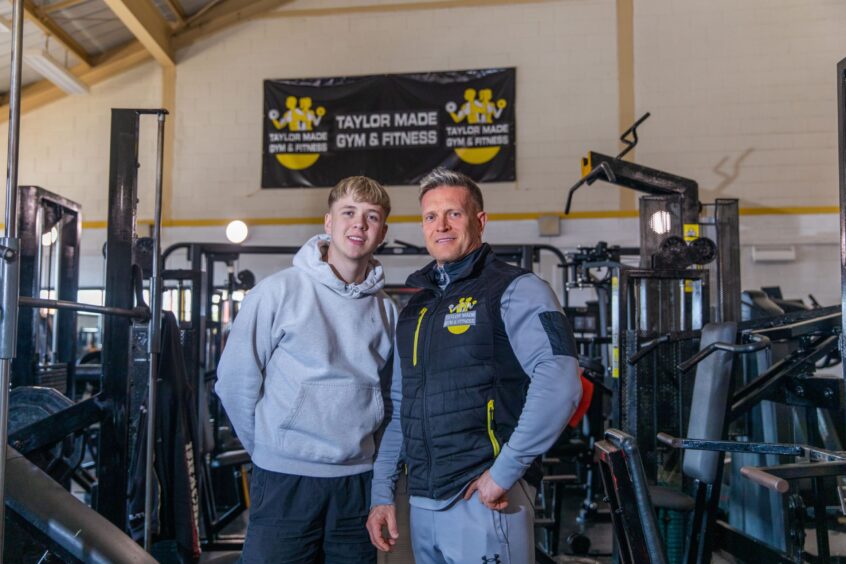 Bodhi Taylor (19) with Dad and owner, Mark Taylor (53) at Taylor Made Gym in Leven. 