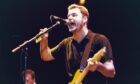 Big Country lead singer Stuart Adam sings into the mic