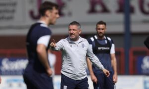 Tony Docherty takes a training session at Dens Park on Thursday. Image: David Young