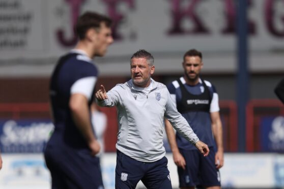 Tony Docherty takes a training session at Dens Park on Thursday. Image: David Young