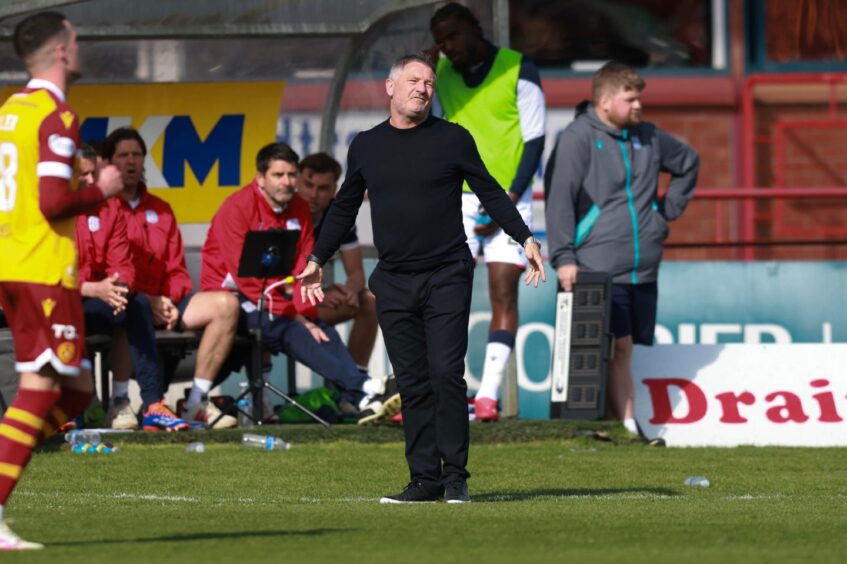 Tony Docherty watches on from the dugout. Image: David Young/Action Plus/Shutterstock