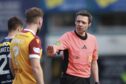 The officials were centre of attention as Motherwell defeated Dundee. Image: David Young/Action Plus/Shutterstock