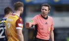 The officials were centre of attention as Motherwell defeated Dundee. Image: David Young/Action Plus/Shutterstock