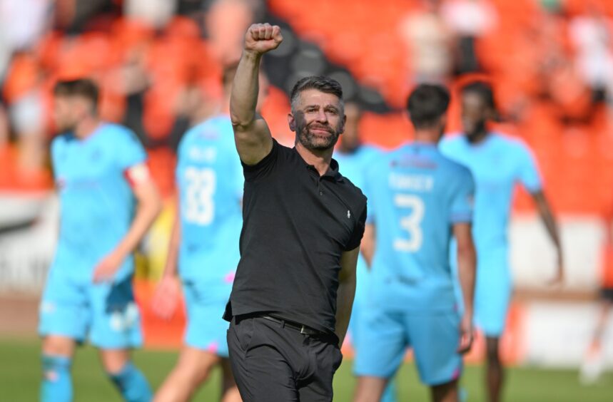 Stephen Robinson, pictured, emerged victorious at Tannadice.