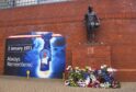Tributes at the John Greig statue in memory of the 66 fans who lost their lives in the Ibrox disaster, 1971.