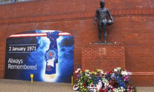 Tributes at the John Greig statue in memory of the 66 fans who lost their lives in the Ibrox disaster, 1971.