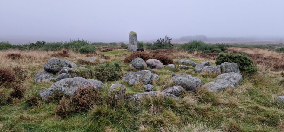 stone circles and standing stones on misty moorland at Meallbrodden by Fowlis Wester