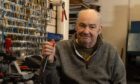 Robert Lawrence owns the R&M Sole and Heel Bar in the Keiller Centre. Image: Paul Reid.