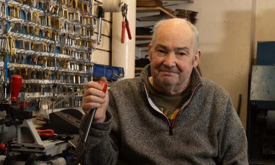 Robert Lawrence owns the R&M Sole and Heel Bar in the Keiller Centre. Image: Paul Reid.