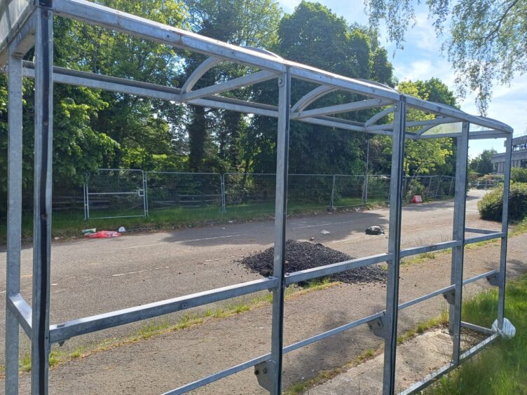 A broken bus shelter
