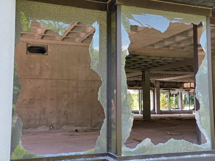 Broken windows in the empty building