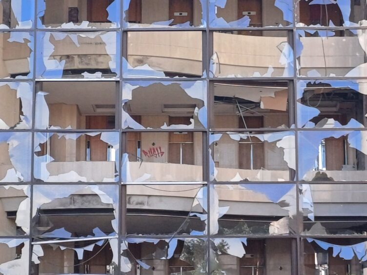 Shattered windows and graffiti