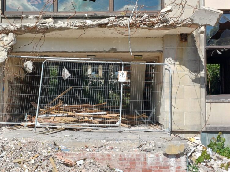 The exterior of the abandoned building