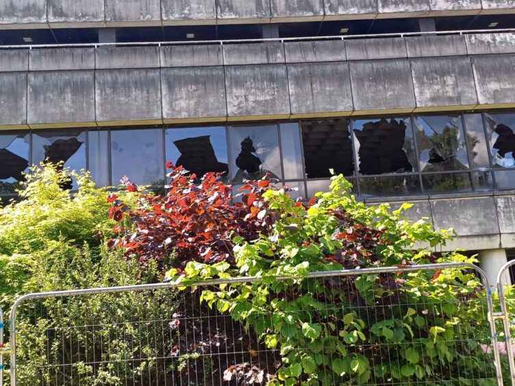 Broken windows at a Craigforth Campus building
