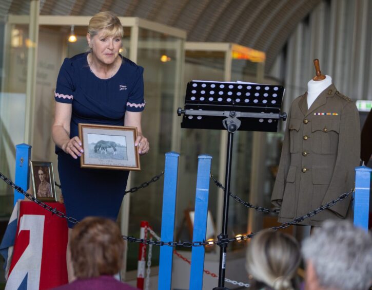 Montrose Air Station researcher Sian Brewis with a photo of war horse Vic.