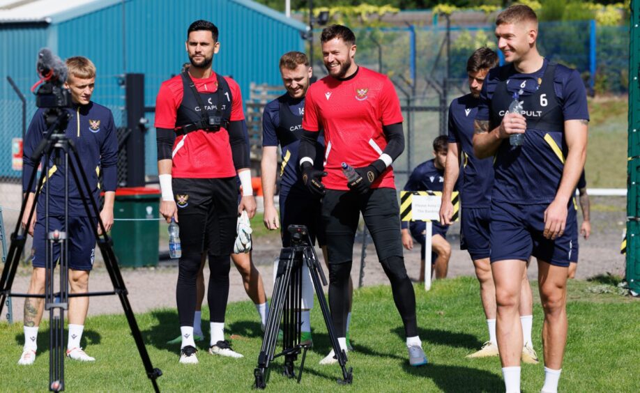 Richards (in red, right) was also a valuable understudy to the outstanding Dimitar Mitov (in red, left) at St Johnstone.