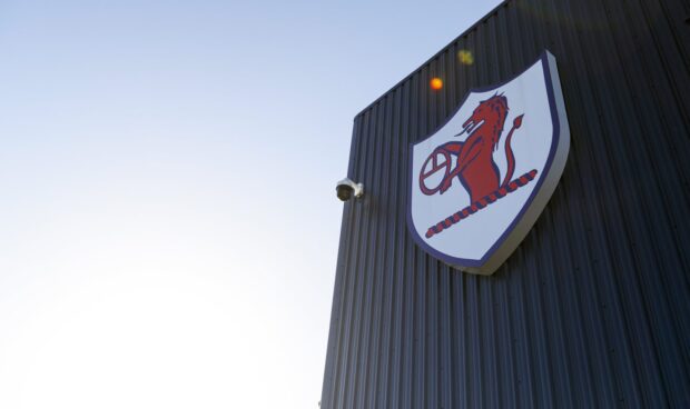 The Raith Rovers badge on the side of Stark's Park.