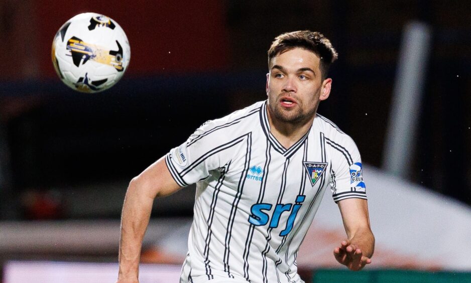 Departing Pars defender Aaron Comrie keeps his eyes on the ball.