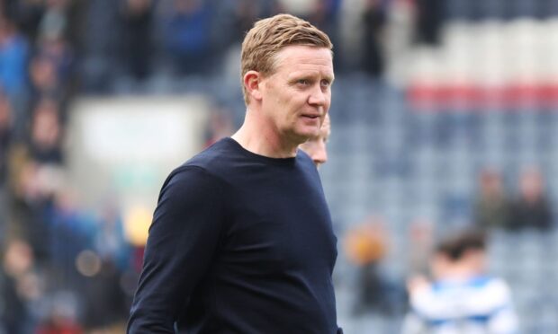 Raith Rovers manager Barry Robson on the Stark's Park pitch.