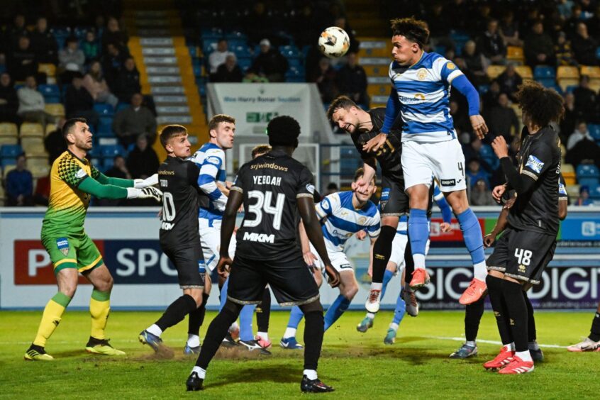 Dunfermline defend a high ball into their box in the 2-0 defeat to Morton.