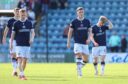 Dundee players trudge off after another late Dens Park defeat. Image: Craig Foy/SNS