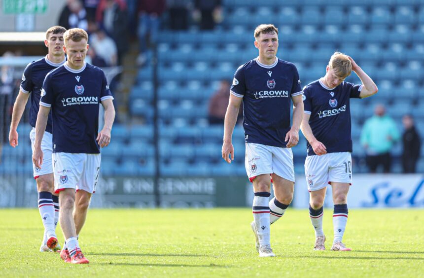 Dundee players trudge off after another late Dens Park defeat. Image: Craig Foy/SNS