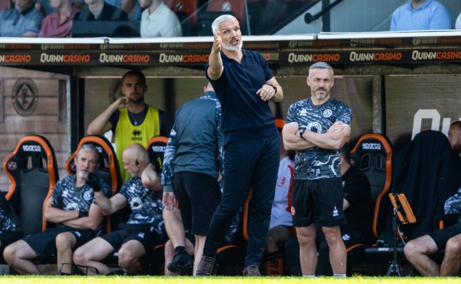 Jim Goodwin watches his team slip to a third successive defeat.