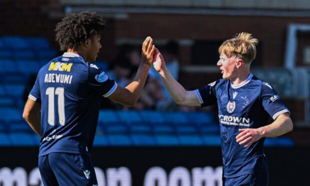 Seun Adewumi and Lyall Cameron give each other a 'high five'