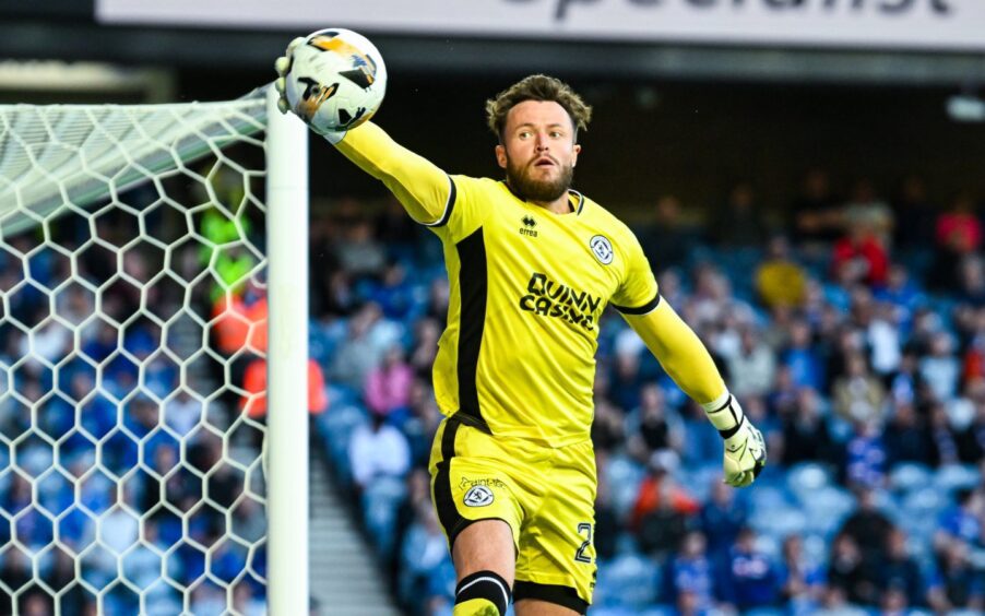 Richards fails to stop a bouncing ball going out for a corner at Ibrox