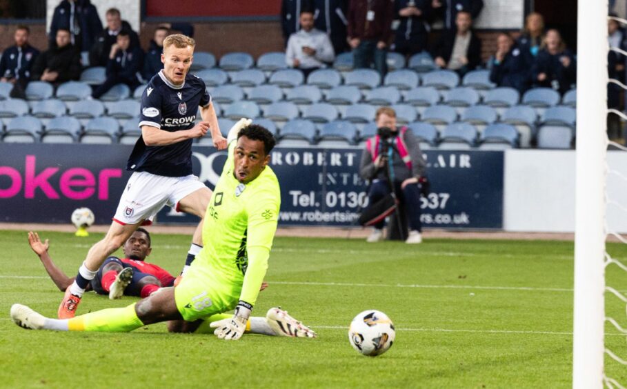 Scott Tiffoney finds the net to put Dundee in front. Image: Ross Parker/SNS
