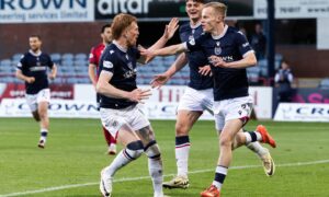 Dundee celebrate Scott Tiffoney's opening goal against Ross County on Wednesday. Image: Ross Parker/SNS
