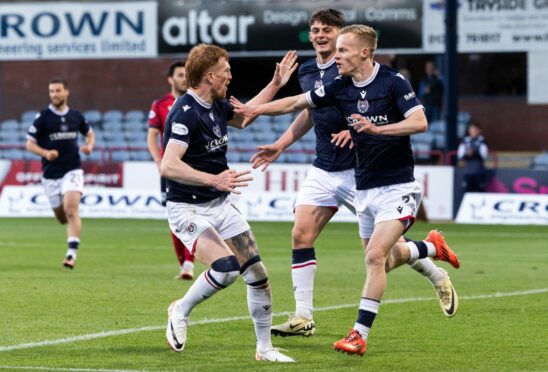 Dundee celebrate Scott Tiffoney's opening goal against Ross County on Wednesday. Image: Ross Parker/SNS