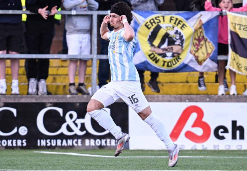 East Fife goal-scorer Adam Laaref runs away in celebration.