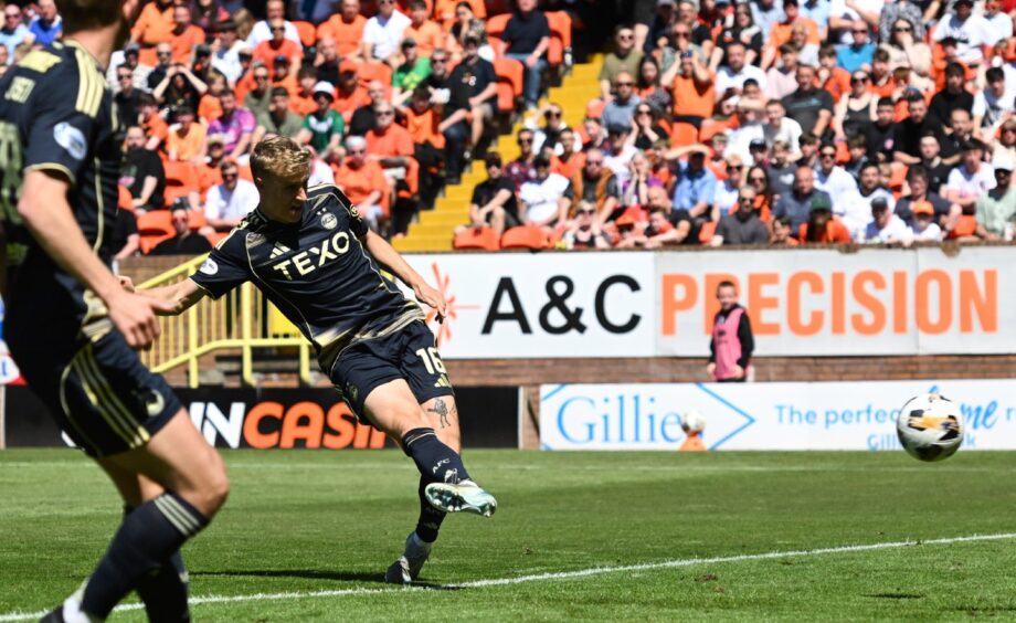 Jeppe Okkels slots home to give the Dons a deserved lead.