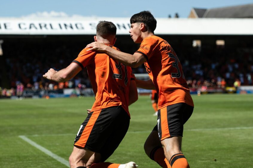 Cleall-Harding, right, congratulates his experienced defensive partner.