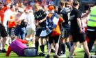 Jack McKenzie hit with seat